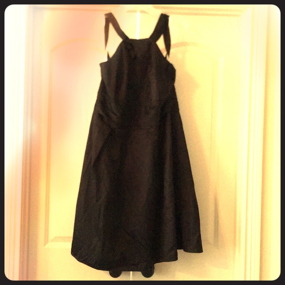 Black cocktail dress with pockets